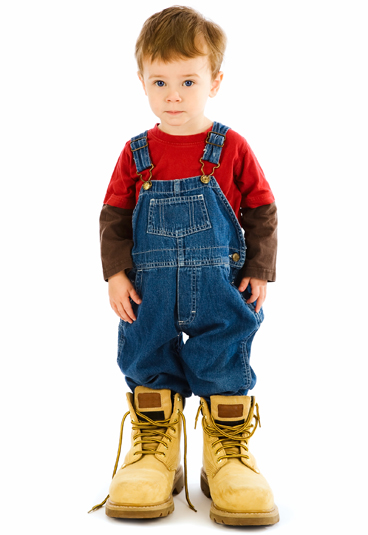 boy wearing dads work boots